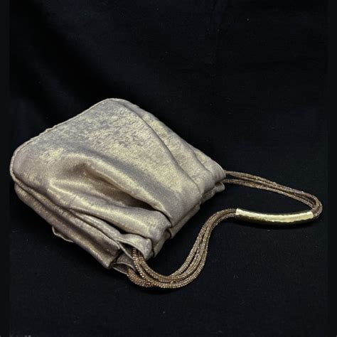 Women Designer Handbags, Crossbody, Totes, Clutches, Wallets – Etcetera