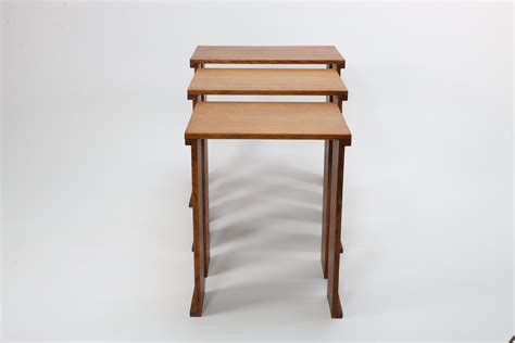 A nest of three Art Deco wild grain oak side tables of planked construction. For Sale at 1stDibs