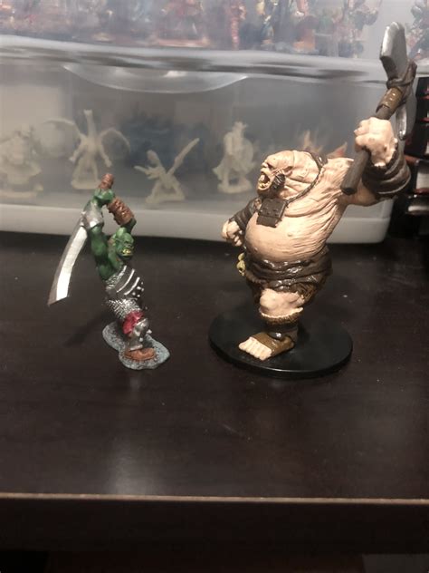 Painted Orc vs. prepainted Ogre | Miniature painting, Ogre, Absinthe ...
