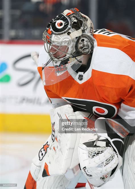 Carter Hart of the Philadelphia Flyers looks on during a stoppage in ...
