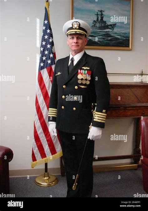 US Naval Officers' Full Dress Navy Blue Uniform Stock Photo - Alamy
