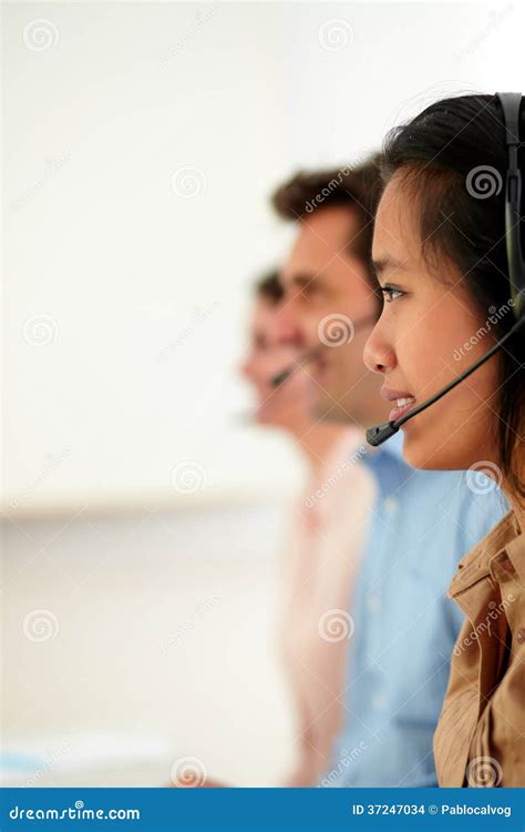 Young Attractive Callcenter People Using Earphone Stock Photo - Image ...