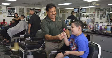 Barbershop celebrates 20 years of fresh cuts