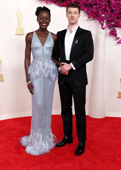 Lupita Nyong’o Heats Up 2024 Oscars Red Carpet With Costar Joseph Quinn ...