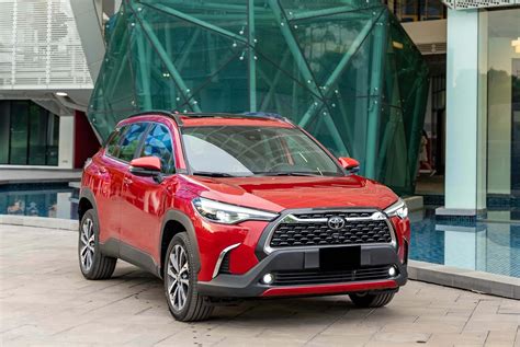 Rent Toyota Corolla Cross Red in Dubai - SUV - Octane.Rent