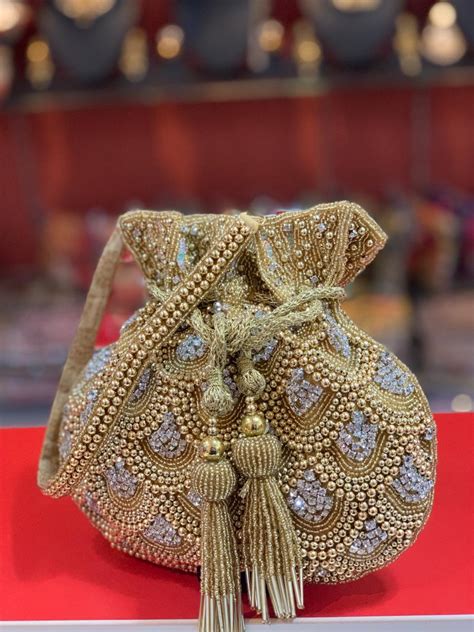 Shop Unique Cream Party Potli Purse Online - Jhakhas