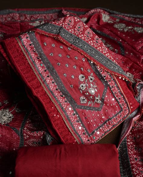 Dark Red colour churidhar material featuring Mirror and thread embroid