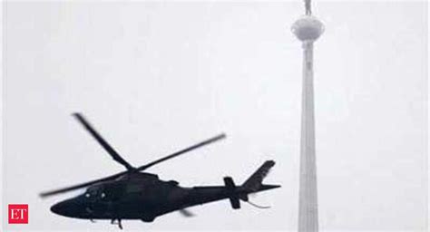 Alain Robert scaling Cheung Kong Centre - | The Economic Times