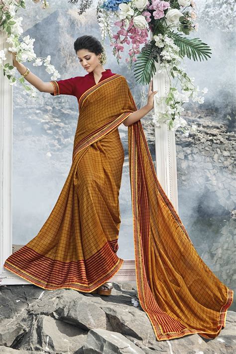 Buy Online Ginger-Yellow and Burgundy Saree with net-pattern – Craftune ...