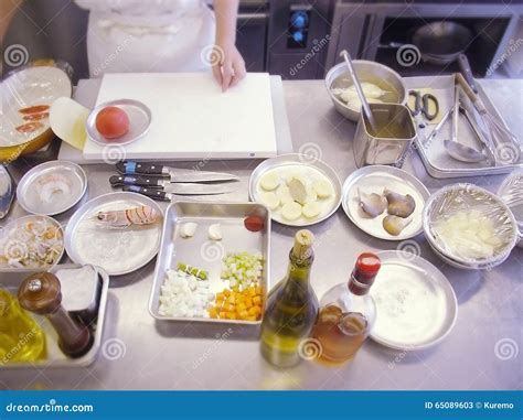 Restaurant Kitchen Table with a Cutting Board. Stock Image - Image of ...