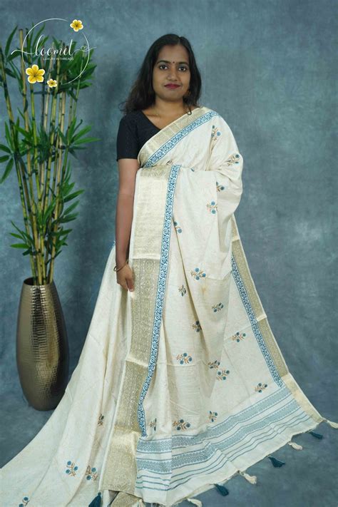 APL3303 Off-White Tussar Silk saree with peacock blue and gold floral ...