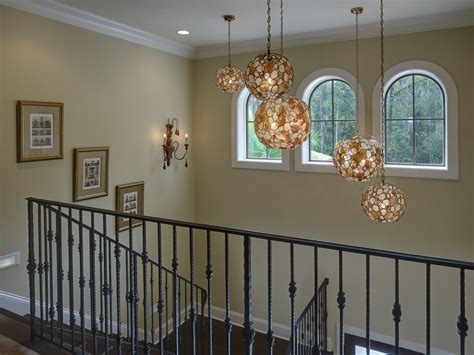 Multiple Pendants in 2 Story Foyer Alderman Interior Design,Inc. Foyer ...