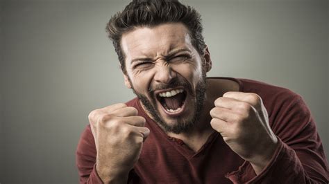11-15-BO Shouting angry man eyes and fists clenched in rage