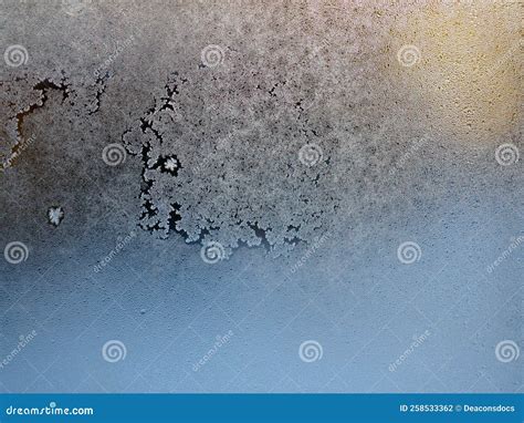 Ice on a Window Pane in Winter. Blue Snowdrifts Peek through the Frost ...