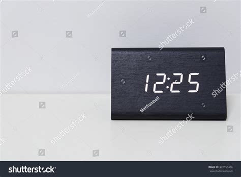 2 Black Digital Clock On White Background Showing Time 12:25 Twelve ...