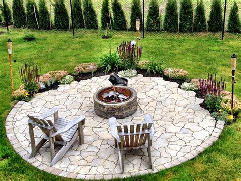 My fire pit garden Karen likes the small flower beds on the perimeter ...