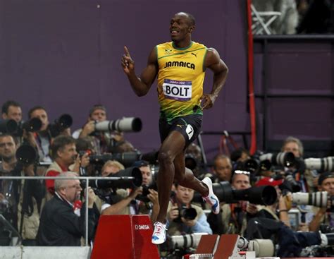 Usain Bolt Defends Olympic Gold; Photos of World's Fastest Man on the ...