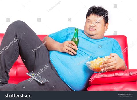 34 Overweight Man Eating Fast Food And Sitting In A Sofa On White ...