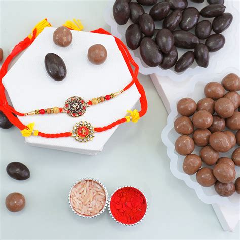 Send Auspicious Golden Rakhis with Dry Fruit Chocolates Gift Pack Online