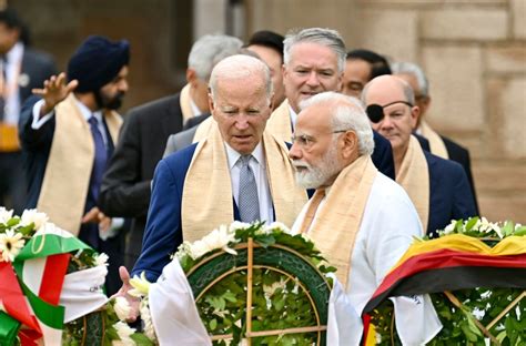 G20 leaders pay respects at Gandhi memorial on final day of India ...