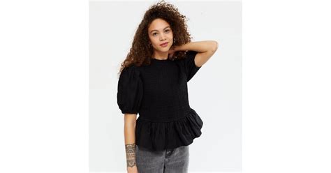 Petite Black Shirred Puff Sleeve Peplum Blouse | New Look