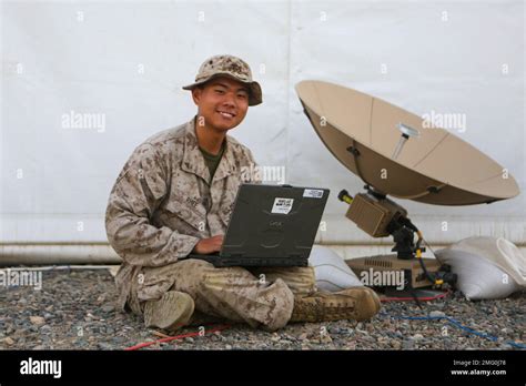 U.S. Marine Corps Lance Cpl. Ethan Rhee, a data systems administrator ...
