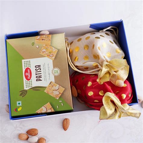Send AD Rakhi with Sweets and Dryfruits Signature Box Online ...