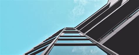 Download wallpaper 2560x1024 building, sky, windows, glass ultrawide ...