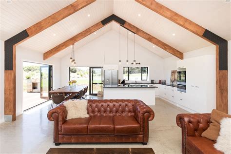 Cathedral ceilings create a stunning effect in the open plan kitchen ...