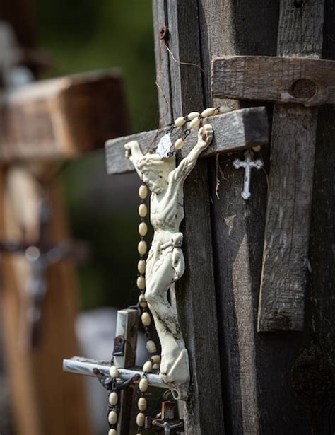 Crucifixion of christ and a large number of crosses at hill of crosses ...