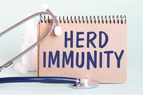 Herd immunity - diagnosis written on a white piece of paper. treatment ...