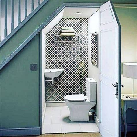 https://www.godownsize.com/wp-content/uploads/2023/12/Under-the-stairs-toilet-1024x1024.jpg?utm_source=chatgpt.com