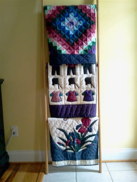 Amish Quilts Displayed on Quilt Ladder