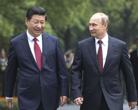 习近平同俄罗斯总统普京举行会谈 强调扩大和深化务实合作_滚动新闻_中国政府网