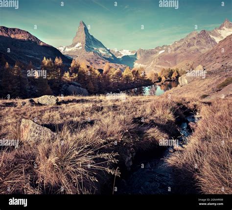 Vintage morning view of Grindjisee lake with Matterhorn / Cervino peak on background. Nice ...