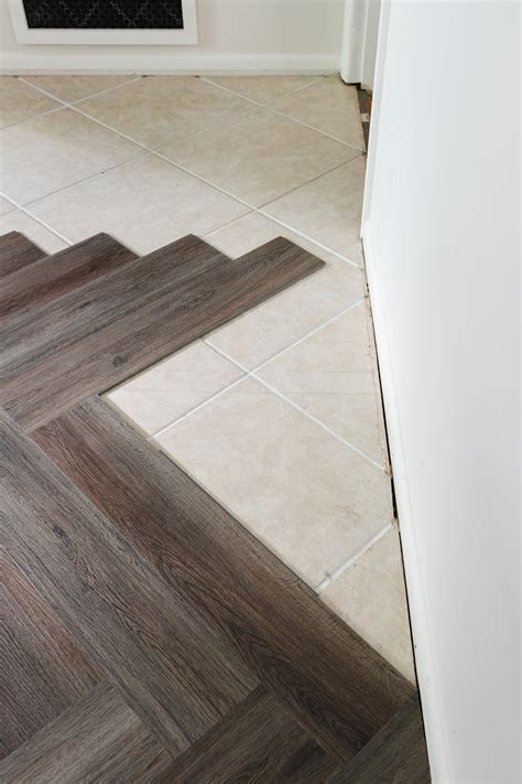 How to Install a Herringbone LVP Floating Floor Over Tile - DESIGN IT ...