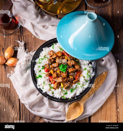Tajin beef stew with rice paprika and sesame seeds Stock Photo - Alamy