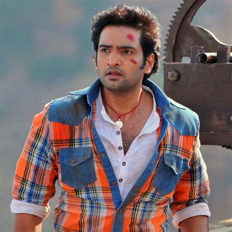 Santhanam in a still from the Tamil movie Vallavanukku Pullum Aayudham