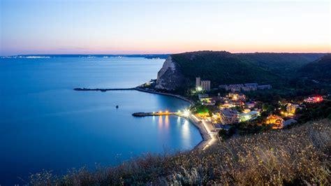 Download wallpaper 2560x1440 coast, sea, lights, buildings, mountain ...