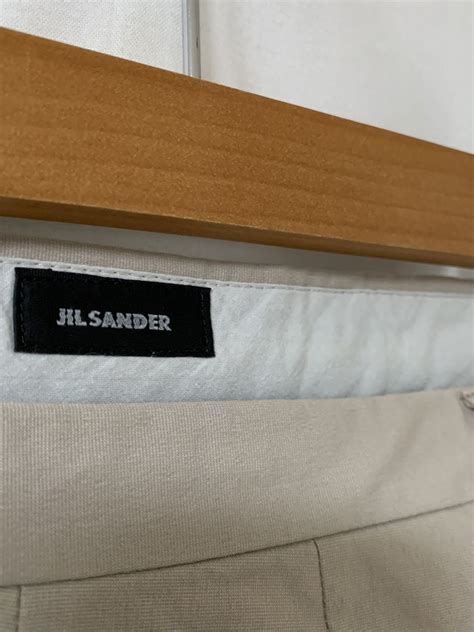 Tapered Silhouette Solid Color Design Slacks "JIL SANDER" | Link