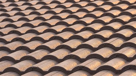 Background of gray concrete tiles roof pattern with golden sunlight ...