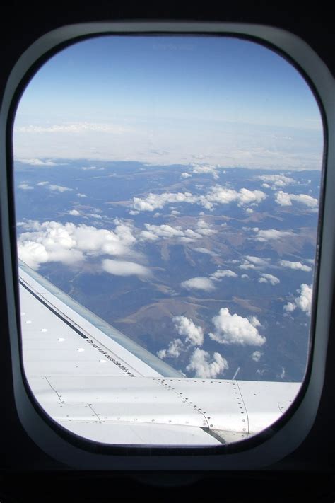 Airplane Window View of Clouds