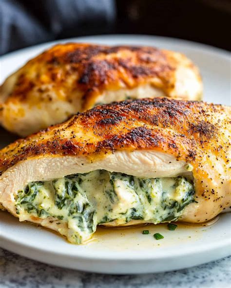 Cheesy Spinach Stuffed Chicken Breasts Recipe - Yumyy