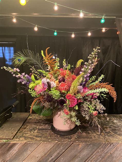 Made this at my florist job today. Been designing about a year and I felt proud : r/FloralDesign