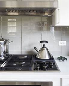 Stacked Kitchen Backsplash by White Waterfall Kitchen In 2020 Contemporary Kitchen Stacked Kitchen Backsplash