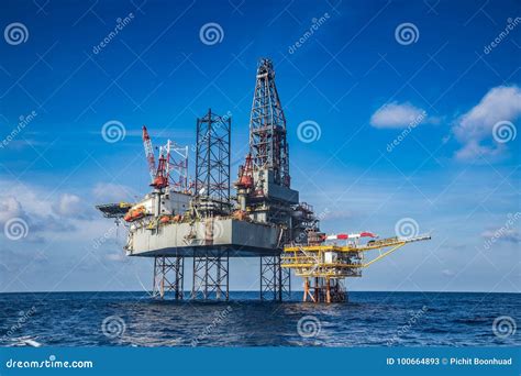 Offshore Oil and Gas Drilling Rig while Completion Well on Oil a Stock ...