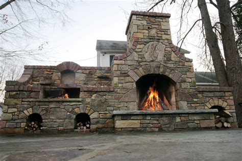 Site is under construction | Outdoor fireplace patio, Outdoor stone ...