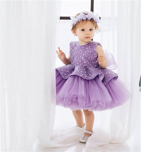 Cute Babies With Purple Dress