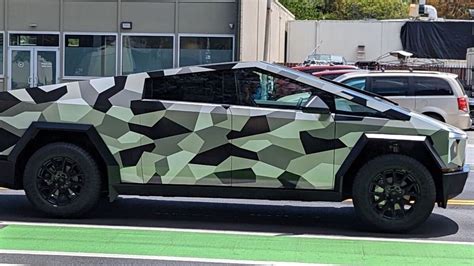 Tesla Cybertruck spotted in camouflage wrap. Elon Musk reacts to leaked ...