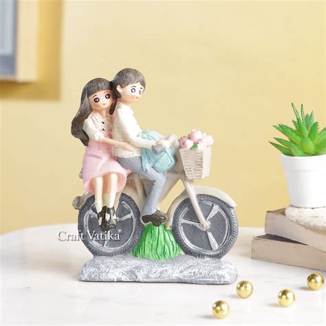 Buy CraftVatika Love Couple on Cycle Statue Showpiece for Home Decor ...